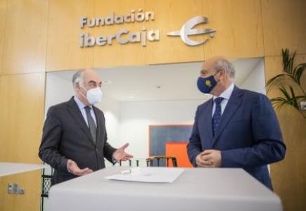 José Luis Rodrigo Escrig y César Romero Tierno hablando en la firma del acuerdo de colaboración